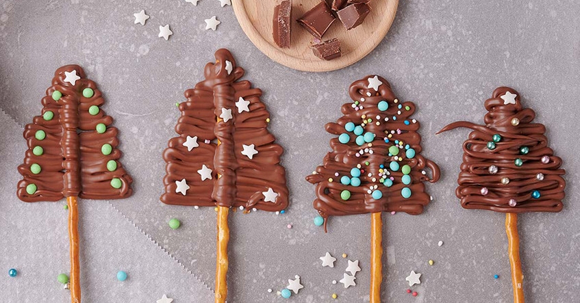 Schokotannenbaum Lollies auf Toppits Backpapier mit Streuseldekoration 